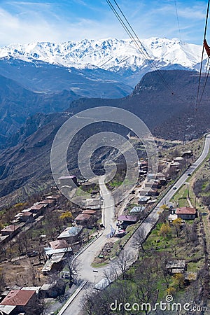 Aerial View of Roads, Snowy Mountains and Villages at Wings of Tatev, Armenia Stock Photo